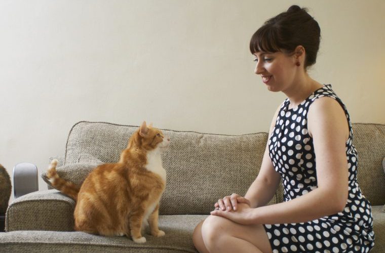 woman in vintage dress with cat old-fashioned cat names